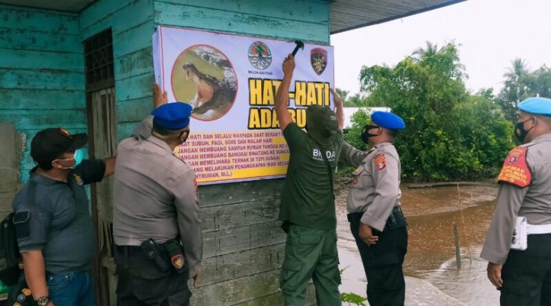 Foto Ditpolairud Polda Kalteng pasang banner imbauan kepada masyarakat