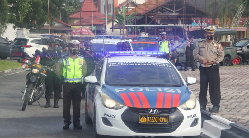 Foto Kapolres Palangka Raya dan jajarannya saat ikuti kegiatan pelepasan distribusi vaksin