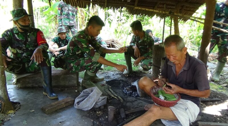 Foto Satgas TMD 110/2021 Nias dan masyarakat saat Adu Bako