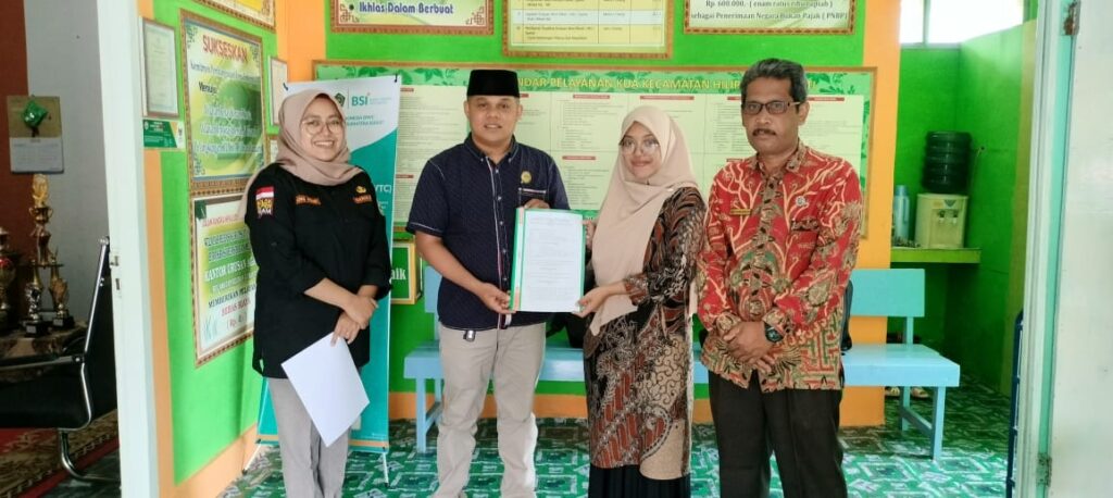 Foto Kepala KUA Hiliran Gumanti Bersama UPT Puskesmas Talang Babungo