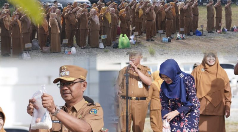 Wakil Bupati Kerinci, H. Murison, S.Pd., S.Sos., M.Si., memimpin upacara dan apel kerja gabungan di halaman Kantor Bupati Kerinci, Bukit Tengah Siulak, Senin (2/3/2026). (Foto: Kominfo Kerinci)