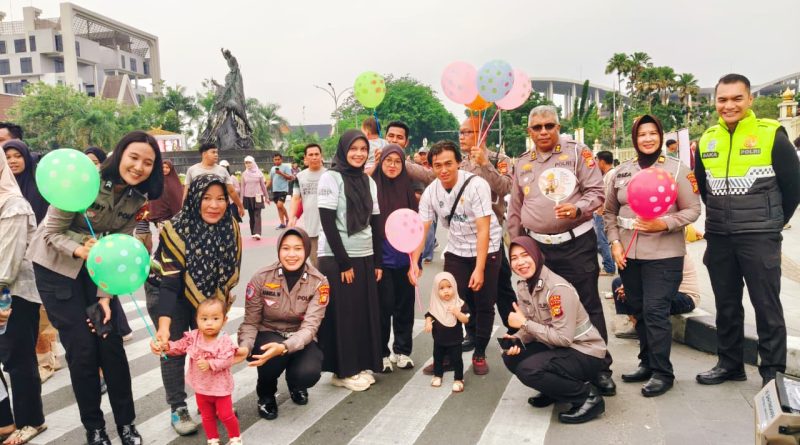 Menyambut Hari Bhayangkara ke-80, Direktorat Lalu Lintas (Ditlantas) Polda Riau menggelar Kampanye Keselamatan Berlalu Lintas dan Program Green Policing di kawasan Car Free Day (CFD) Jalan Jenderal Sudirman, Pekanbaru, Minggu (14/6/2026). (Foto: Humas Ditlantas Polda Riau)